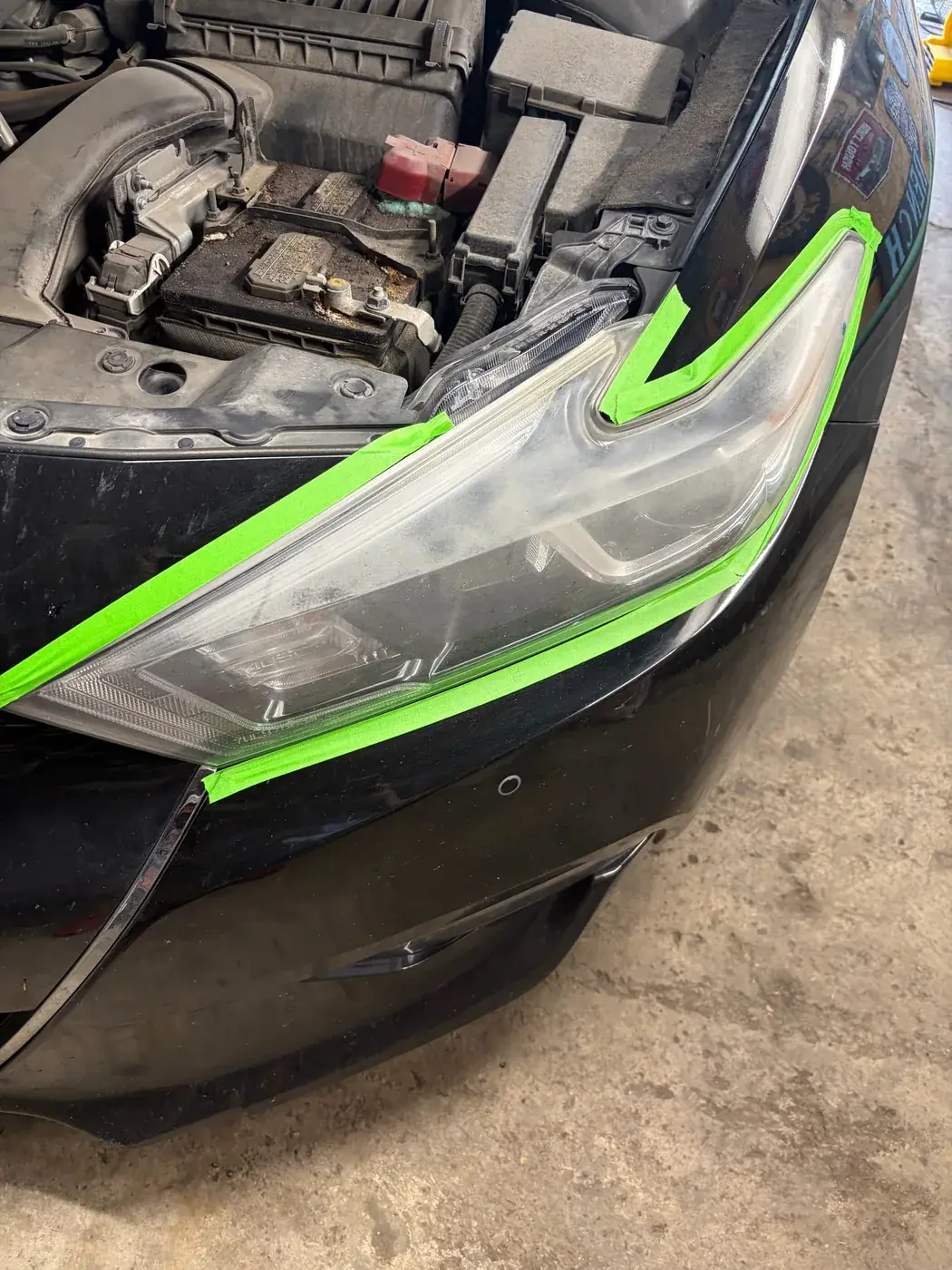 Nissan Maxima headlight, before and after, before