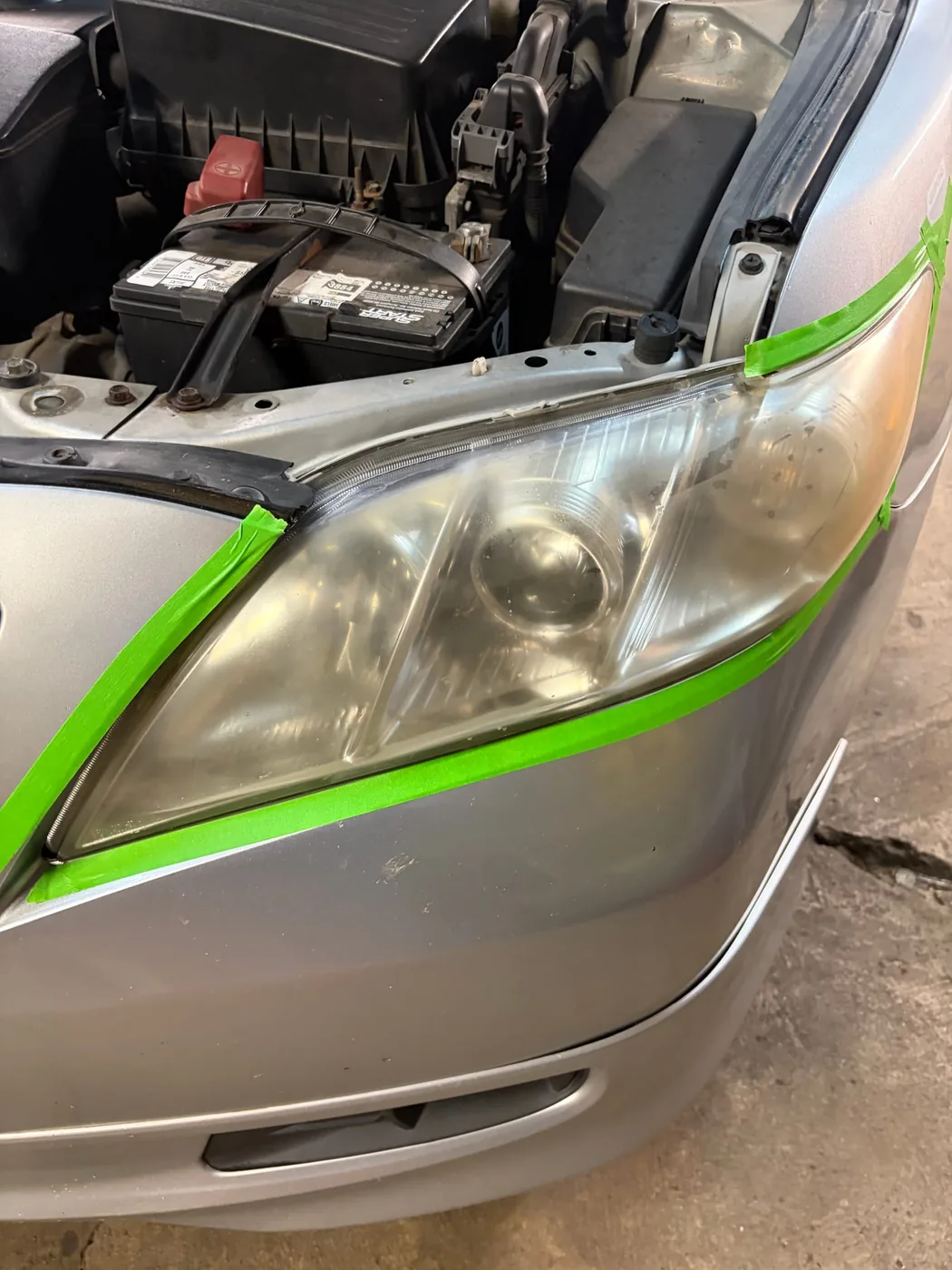 Toyota Camry headlight, before